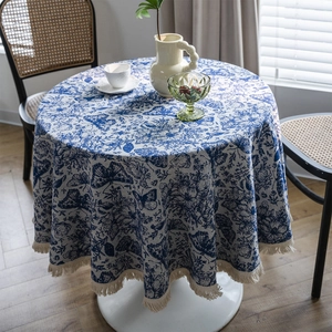 Elegant white round tablecloth with blue butterfly floral pattern and fringe tassel edges