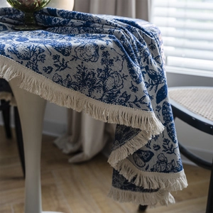 French vintage Toile de Jouy round tablecloth with elegant blue floral patterns and tassels