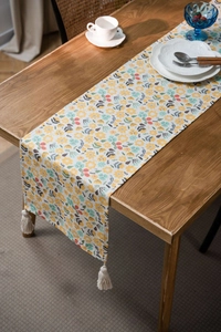 Floral print table runner featuring cotton linen texture and elegant white tassel details