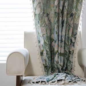 Artistic floral jacquard woven tapestry with tassels in fresh green and soft pink hues