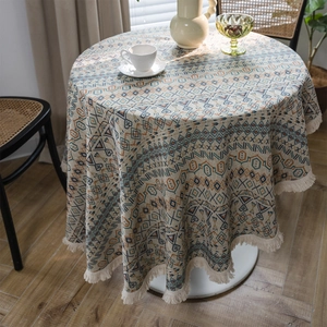 Bohemian round tablecloth with blue and orange geometric patterns and tassels