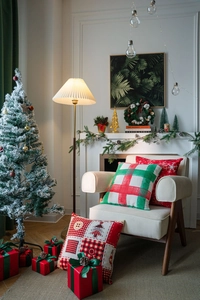 Detailed view of red and green festive Christmas pillow covers with classic snowflake patterns