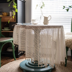 Elegant off-white round crochet lace tablecloth with fringe edge for rustic home decor