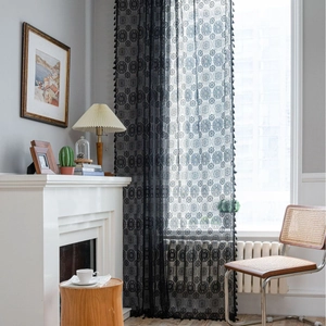 Elegante tenda in pizzo nero con motivi floreali e frange per decorazioni vintage casa