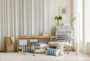 Detailed view of jacquard geometric patterns and handmade tassels on cotton linen pillows