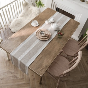 Nordic jacquard geometric table runner with tassels in beige cotton blend fabric