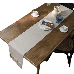 Nordic cream jacquard table runner with geometric weaving texture and handmade tassels