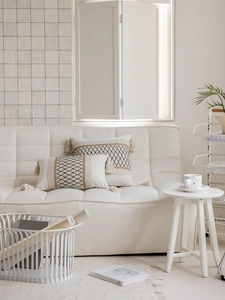 Detail of bohemian woven pillow covers with geometric patterns and handcrafted tassels