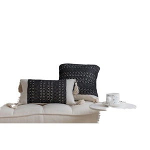 Modern black and white geometric jacquard throw pillow set with boho cotton tassels
