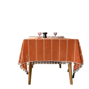 Nappe en coton lin terre cuite avec broderies géométriques et bordures à glands