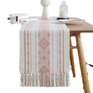 Runner da tavola Boho in cotone jacquard con motivi geometrici e dettagli di nappe