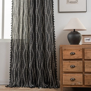 Black Bohemian curtain with white wave patterns and decorative tassels for home decor