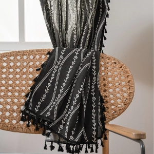 Black kitchen curtain with white curved floral print and decorative tassels for windows