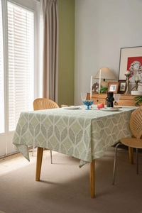 Detailed texture of green geometric pattern tablecloth in high-quality cotton linen fabric