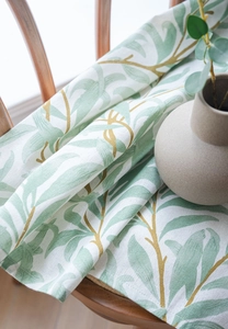 Macro detail of botanical leaf print on premium cotton linen fabric for home decor
