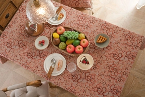 Detailed view of heavy jacquard tablecloth with vintage pink floral rose patterns