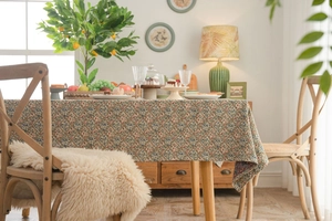 Close-up of vintage floral jacquard tablecloth fabric with thick woven texture