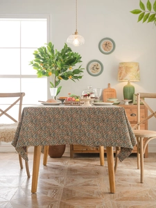 Close-up of vintage floral jacquard tablecloth with thick texture and drape