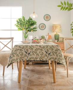 Detailed close-up of bird and floral jacquard patterns on heavy-duty rectangle tablecloth
