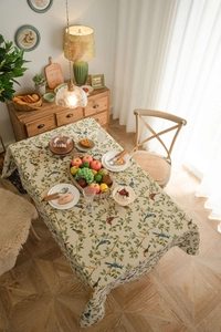 Detailed view of floral bird print tablecloth with thick jacquard fabric for rectangular table