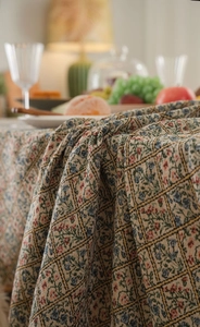 Detailed macro view of the thick jacquard fabric with floral diamond pattern and texture