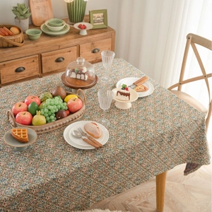Floral American style jacquard tablecloth with small flowers on a wooden table
