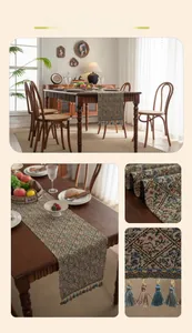 Detailed close-up of jacquard table runner with floral patterns and tassel trim