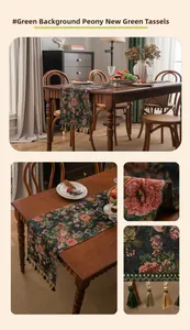 Detail of green jacquard table runner with peony patterns and decorative fringe tassels