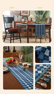 Macro detail of blue and white diamond jacquard table runner with decorative tassels