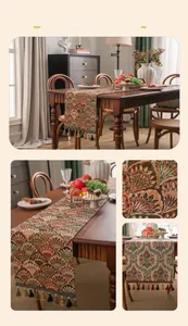 Macro detail of jacquard table runner showing ginkgo leaves and vintage floral patterns