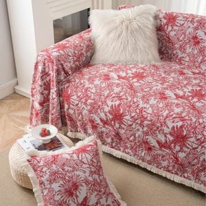 Red Toile de Jouy sofa throw blanket with leopards and palm trees pattern and tassels