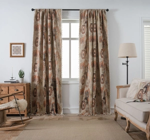 Detail of bohemian curtain with retro whirlpool pattern and white tassel fringe trim
