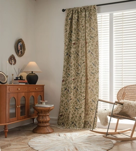 Detailed view of floral bird jacquard fabric and white tassel edge on farmhouse curtain