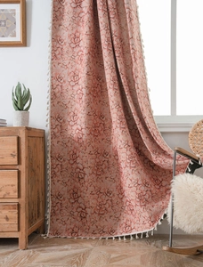 Detail of pink succulent floral jacquard fabric with elegant white tassel fringe