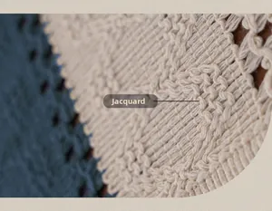 Macro detail of navy and beige jacquard woven fabric texture with intricate patterns