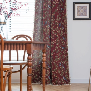 Red jacquard curtain with bird and floral patterns and tassels in an American retro style