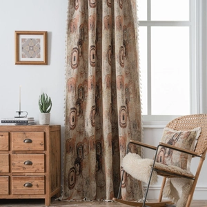 Bohemian jacquard curtain with concentric rings pattern and white side tassels