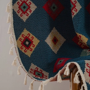 Blue geometric jacquard tapestry curtain with ethnic diamond pattern and fringe trim
