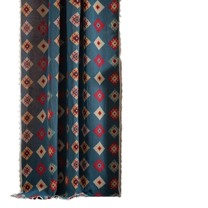 Bohemian dark teal scarf with geometric jacquard patterns and delicate fringe detail