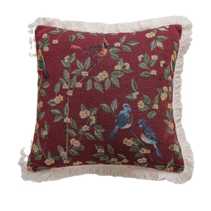 Square jacquard throw pillow featuring floral bird patterns and decorative fringe trim