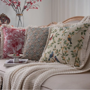 Jacquard decorative throw pillow covers with fringe and vintage tapestry patterns on sofa