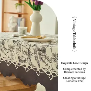 Vintage French cream style rectangle tablecloth with black floral patterns and wavy edges