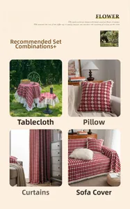 Close-up of red plaid table runners and pillowcases with delicate white lace trim