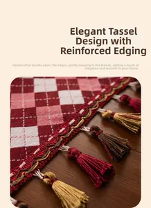 Detail of red and white plaid table runner featuring festive colorful tassel fringe trim