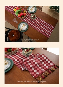 Close-up of retro red and white checkered table runner with decorative tassels