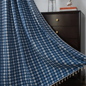 Blue and white checkered curtain with tassels for a french country home decor look