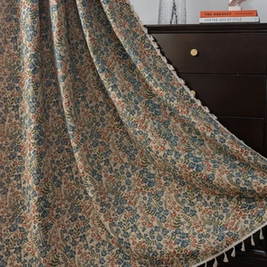 Blue floral jacquard curtains with white tassels and pastoral flower patterns