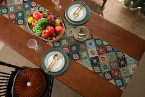 Detailed close-up of bohemian table runner with vintage geometric jacquard patterns