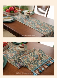 Detail showing retro floral table runner with blue pink tassels and jacquard texture