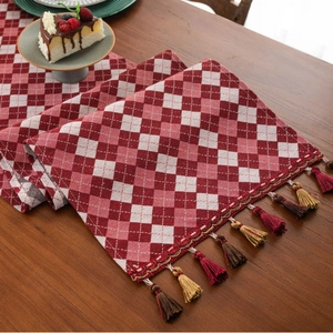 American retro red and white checkered table runner with decorative tassels for dining decor